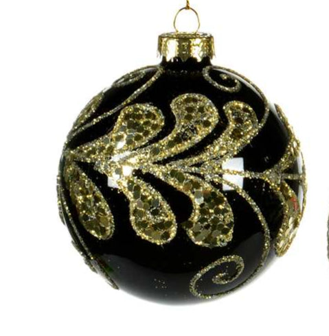 Three black Christmas ornaments with gold decorative patterns