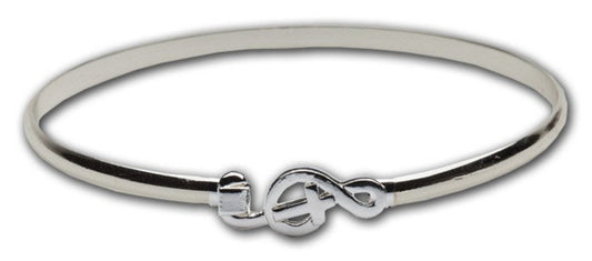 Silver bracelet with a music note design on a white background