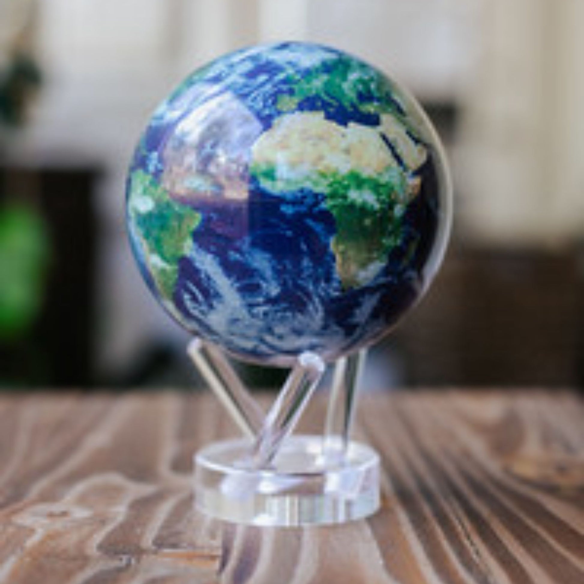 4.5" Mova Globe – rotating Earth globe with moving clouds, desktop decor and educational globe