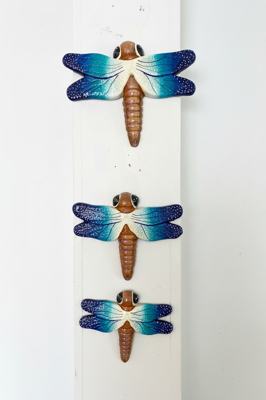 Ceramic Dragonflies on White Wall