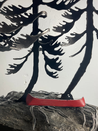 Cathy Mark windswept pines with canoe on granite