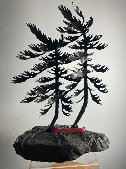Cathy Mark windswept pine with red canoe on granite