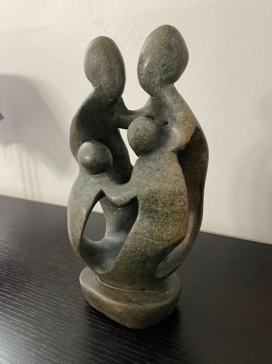 Stone sculpture of a family of 4 - Ukama - 4K