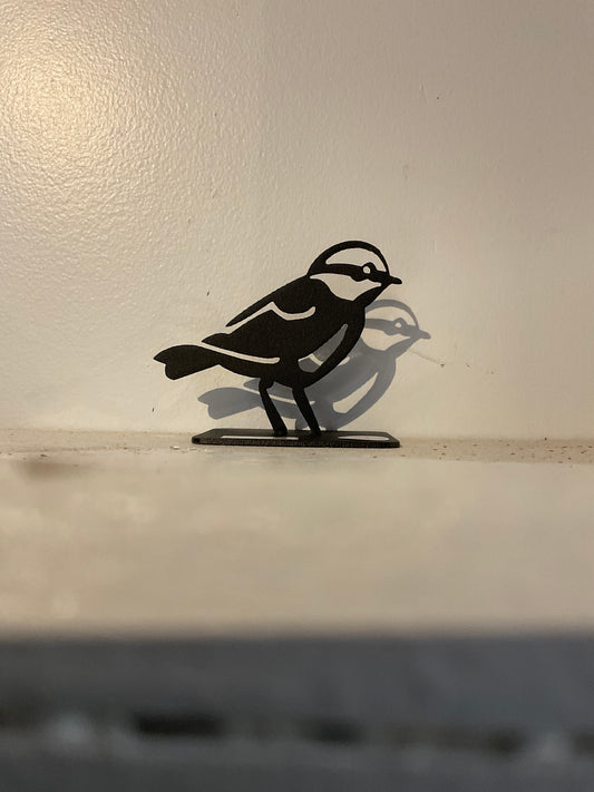 Small metal bird