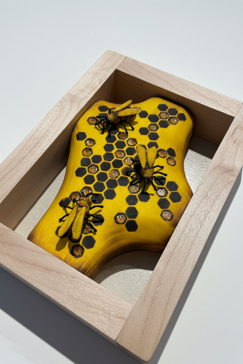 Wooden bee frame by artist Adam Mack